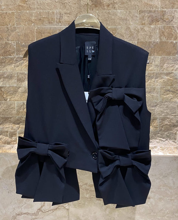 54-1012 Sleeveless Jacket with bow details سترة بدون أكمام مع تفاصيل على شكل فيونكة