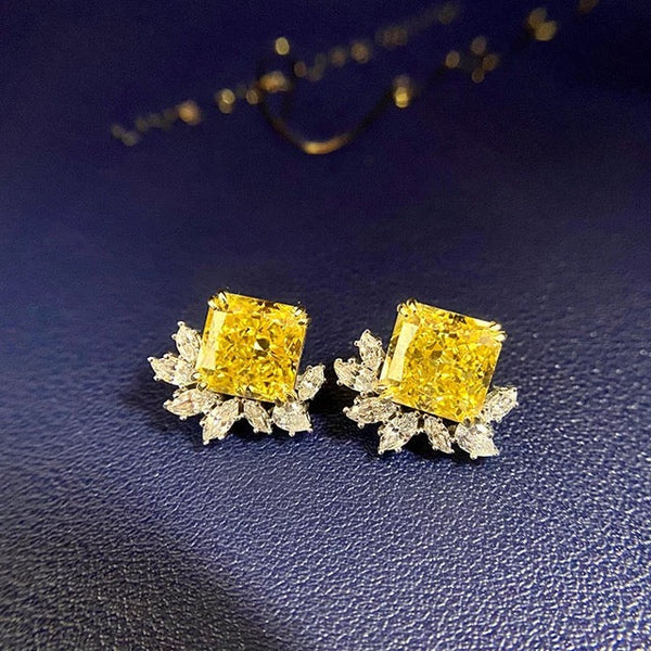 Yellow Diamond Stud Earrings أقراط الماس الأصفر